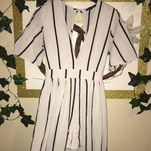 High low black and white stripped romper